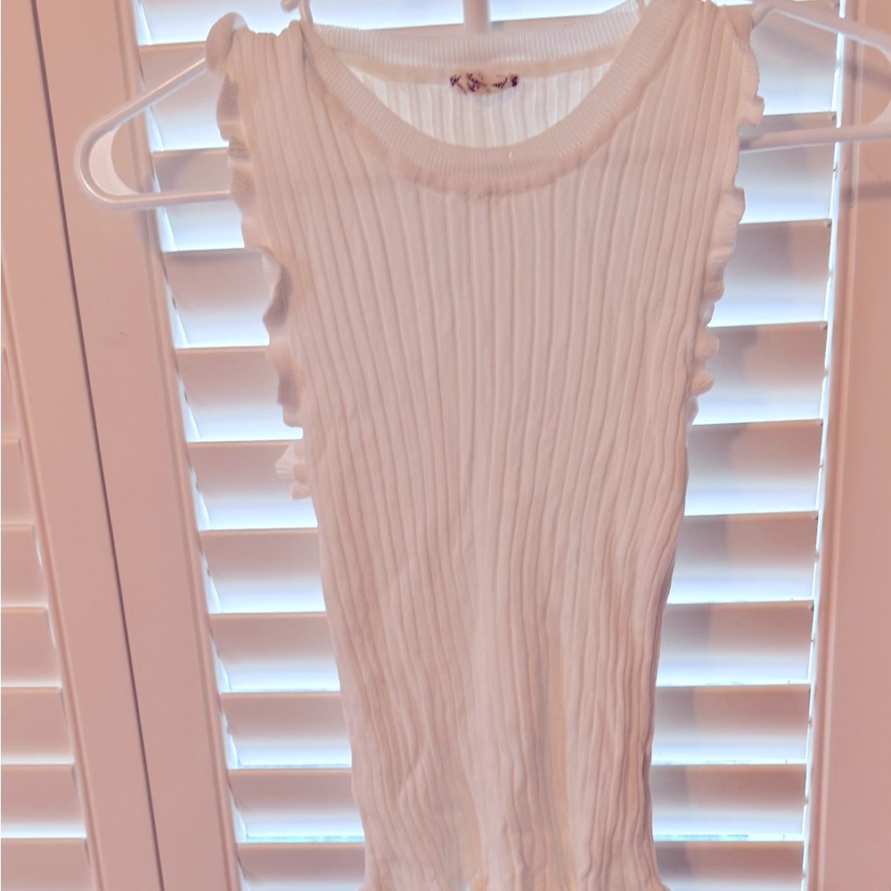 White ruffled shirt